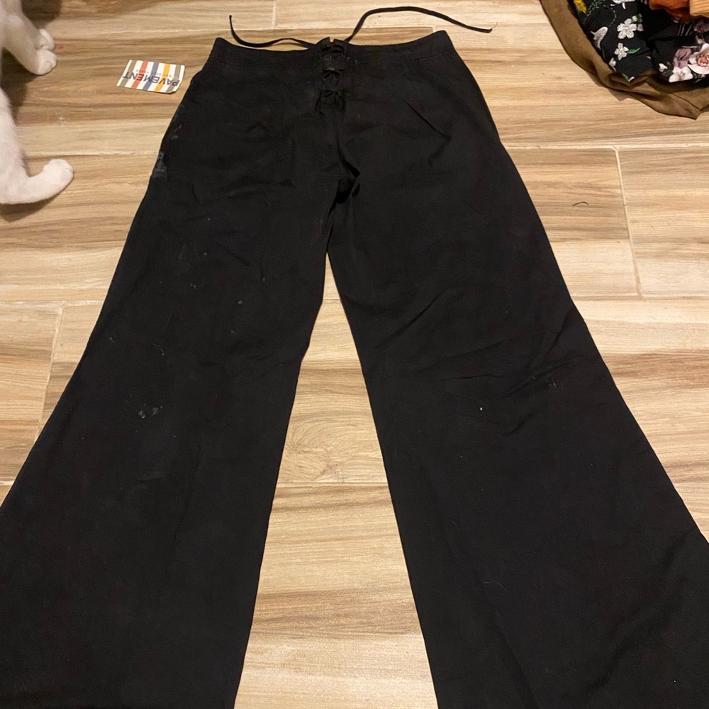 black low rise flare pants with lacing in the back